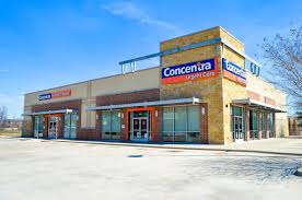 Doctor consulting a patient at Concentra Urgent Care