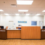 Concentra Urgent Care staff performing diagnostic testing