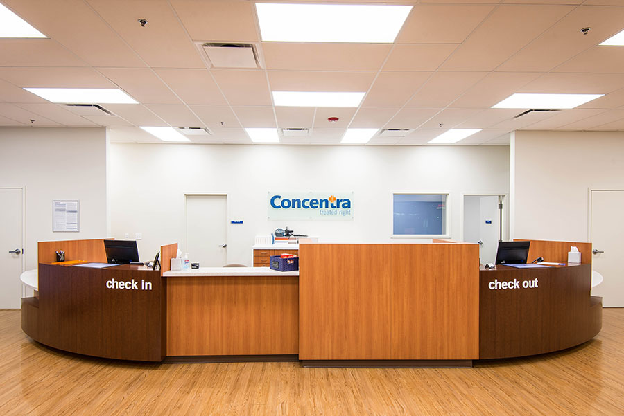 Concentra Urgent Care staff performing diagnostic testing