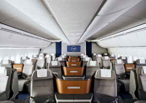 Passenger enjoying Lufthansa Business Class meal service